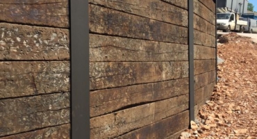 Railway sleeper retaining wall